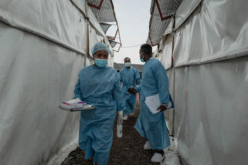 Image credit: Health care workers at an mpox treatment center near Goma, Congo, on Aug. 17, 2024. Photo by Guerchom Ndebo / AFP via Getty Images.